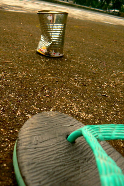 The traditional Filipino game of Bato-lata (Cebuano) or Tumbang preso (Tagalog)