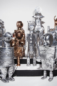 Robots and Femmebots in polished bronze and aluminum