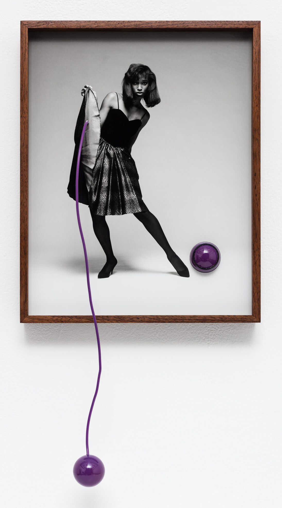 Elad Lassry, Untitled (Woman B), 2015 (detail). Silver gelatin print, wire, plastic, walnut frame, 21 1/2 x 11 1/2 x 2 1/2 inches