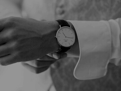 A stylish watch on a man's wrist shows that he values time
