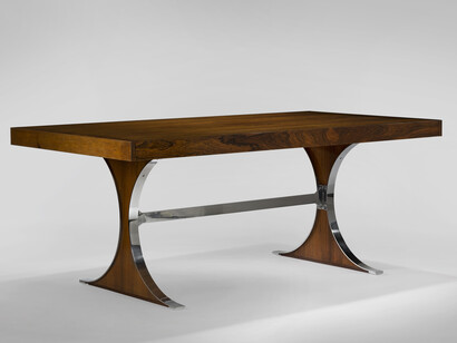 Rene Jean Caillette, Sylvie Dining Table, with drawers on ends, 1961, Pallisander, steel, acajou, 28.74 H x 72.83 x 37.4 inches, 73 H x 185 x 95 cm. With extensions: 28.74 H x 122.25 x 37.5 inches. Image courtesy of Demisch Danant. Photo by Thierry Depagne.