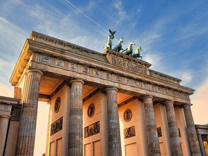 A low-angle view of the Brandenburg Gate in Berlin, Germany, symbolizing the nation's growing influence in shaping Europe's future