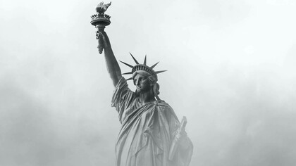 Statue of liberty under smoke