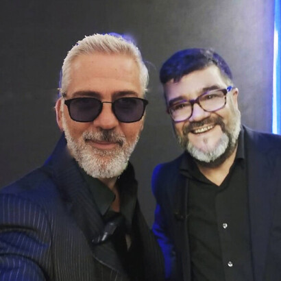 Tiziano Buccarello with Francesco Pannofino, the Italian voice of George Clooney