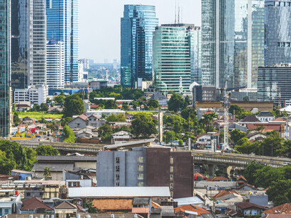 Aerial view of Jakarta, where towering business districts stand alongside the challenges of urban inequality