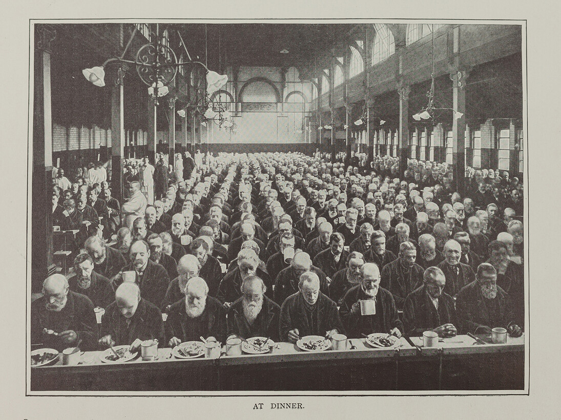 Men at dinner in St Marylebone Workhouse, London, c1900.  Photograph published in Living London (Cassell, 1901). Credit: Geffrye Museum of the Home
