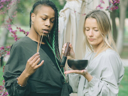 With incense swirling around them, they open their hearts to the lessons of karmic ties and the bliss of soulmate connections, fostering growth and understanding