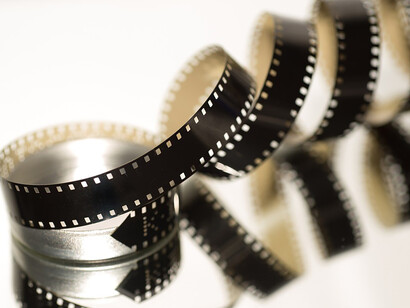 Vintage film roll on a clean white backdrop