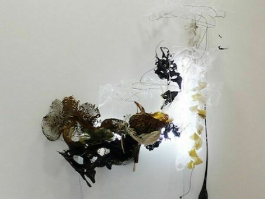 Judy Pfaff, Night Blooming Ceres, 2012, steel wires, various plastics and paper, shellacked Chinese paper lanterns, honeycomb cardboard and florescent lights, 95” x 83” x 32”