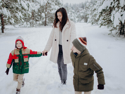 Family enjoying time together in the snow