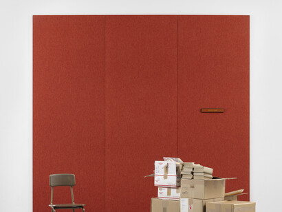Theaster Gates, Encyclopedia Blacktannia (detail), 2023. Fabric on panel with metal plaque, Jet and Ebony magazines in cardboard boxes on wooden pallet, bronze chair and framed letter, dimensions variable © Theaster Gates. Photo © White Cube (On White Wall)
