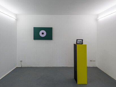 Gregorio Samsa, Untitled, 2015  (Installation)
Flag, 2015, Collage of fabrics, 60 x 90 cm, 
Self-Portrait, 2015, Photo frame on lacquered wooden sculpture, 138 x 30 x 30 cm
