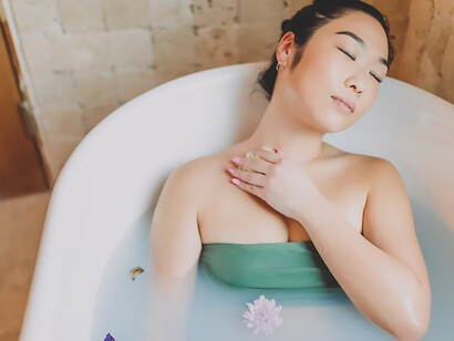 In the tranquility of her bath, a woman immerses herself, finding solace in self-love and embracing the serenity of Galentine's Day