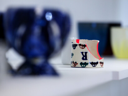 Installation view of Many a Slip, invited artists juggle with the domestic symbol of 'the cup' (2015), focus on Hans Stofer 'Cracking Up' at Marsden Woo Gallery, image © Philip Sayer, courtesy of Marsden Woo Gallery, London