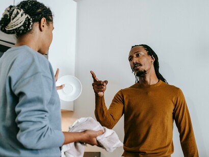 A couple showcasing domestic violence through words and actions