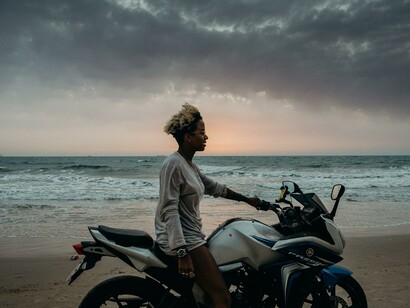 Person on a motorbike on the beach 
