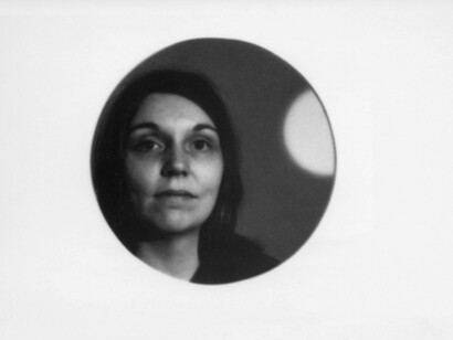 Nancy Holt framed by the Holes of Light installation at LoGiudice Gallery, New York, 1973
Photo: Richard Landry
© Holt/Smithson Foundation, Licensed by VAGA at ARS, New York
