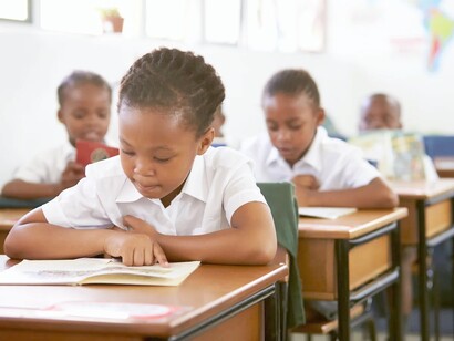South African children busy learning in class, at school