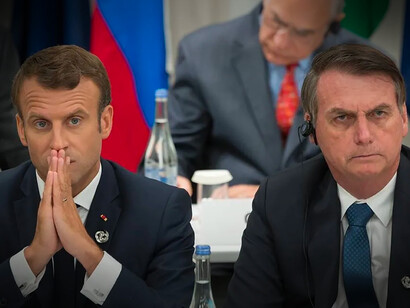 Les Présidents Macron et Bolsonaro. Sous couvert d’objectifs écologique et humaniste, le président Emmanuel Macron a cherché à pousser le Brésil dans une sorte d’engrenage "néocolonial" © Jacques Witt / AFP