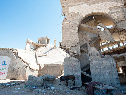 Collapsed building in Gaza following Israeli airstrikes during the ongoing war