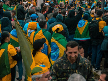 Demonstrators in Brazil rally for democratic reforms amidst a backdrop of social unrest and political uncertainty