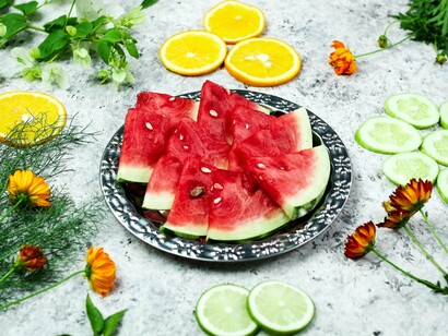 A plate of colorful fruits surrounded by fresh vegetables, symbolizing the value of balanced nutrition over supplement trends