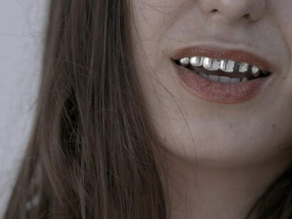 Lili Reynaud-Dewar, Teeth Gums Machines Future Society (Film), 2016. Courtesy of Museion