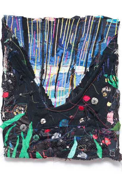 Todd Knopke, V, 2015, fabric, thread, wood, rocks, shells, necklace gems, yarn, tassels, metal parts from charm bracelet, seed, string, marker
18 x 15 x 1 inches
