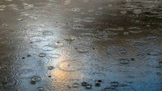 The rain, forming mud on the ground