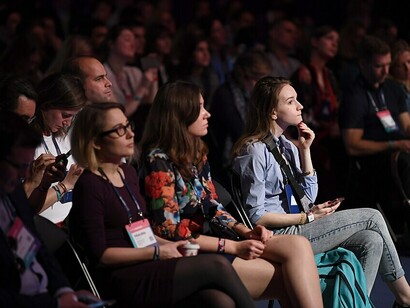 Audience members are listening to a speaker at the Future Societies Stage during day two of Web Summit 2017 at the Altice Arena in Lisbon, Portugal