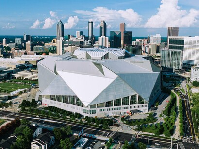 The striking architecture of Mercedes-Benz Stadium in Atlanta, reflecting the world-class facilities available to fans