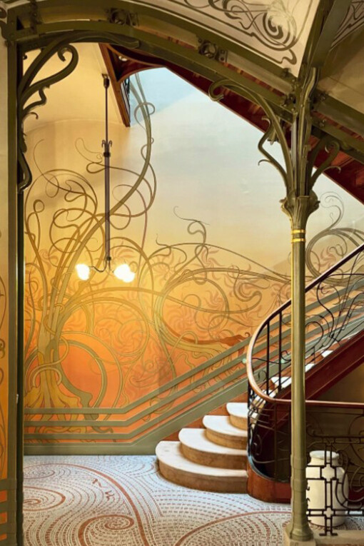 The interior of Casa Batlló, featuring a decorative ceiling and large windows, Barcelona, Spain