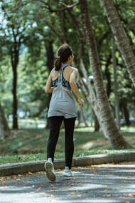 With every stride through the greenery, she taps into the mood-lifting endorphins that make jogging an effective natural remedy for anxiety and depression