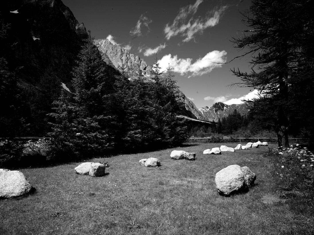 Richard Nonas, Bones, 2014, 36 Mont Blanc granite boulders, Two perpendicular lines, each 28 meters long, Val Ferret, Courmayeur, Italy. ©Richard Nonas. Courtesy of Fergus McCaffrey Gallery