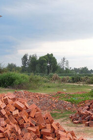 The author's father quit his job delivering bricks due to unequal pay, because of his race