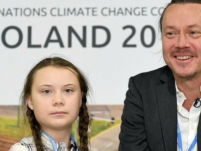 Greta Thunberg and her father Svante at a press conference during COP24
