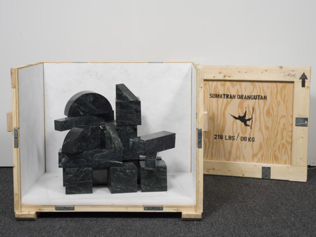 David Brooks, Marble Blocks - 218 lbs - or Sumatran Orangutan (Indonesia), 2014 Verde antique marble, stainless steel pins, wood crate, stencil paint, Tyvek, packing material, hardware 27 x 35 x 24 in. (68.6 x 88.9 x 61 cm) Courtesy of the artist and American Contemporary, New York
