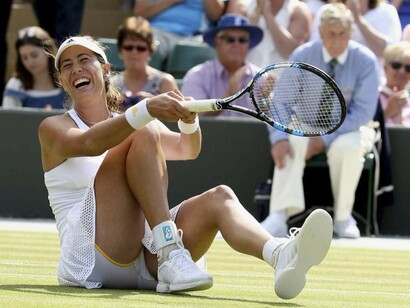 Muguruza se ríe durante un partido