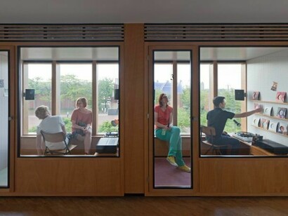 Phil Collins, my heart's in my hand, and my hand is pierced, and my hand's in the bag, and the bag is shut, and my heart is caught, 2013. Sound installation and collaborative project with Gulliver survival station for the homeless Cologne. Ten 7" vinyls, listening booths, turntables, amplifiers, speakers; dimensions variable. Installation view, In Every Dream Home a Heartache, Museum Ludwig, Cologne, 2013. Courtesy Shady Lane Productions, Berlin and Tanya Bonakdar Gallery, New York