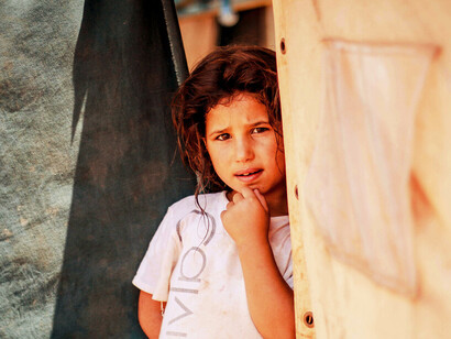 Displaced by conflict and uncertainty, this child’s gaze speaks to the human cost of Syria’s collapse and the fragile hopes for a future in Rojava