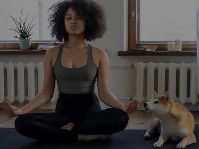 Engage in the heartwarming scene of a woman and a girl bonding with their furry canine companion as the woman gracefully incorporates Pilates, showcasing the joy of fitness and companionship in this delightful image