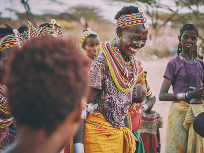 A woman from the village of Kargi, a remote town in eastern Kenya, happily smiling