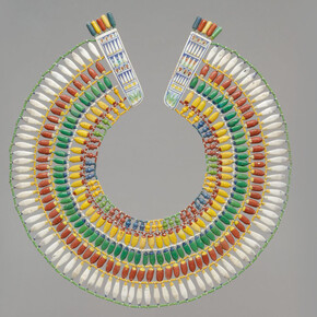 Period:New Kingdom, Amarna Period
Dynasty:Dynasty 18
Reign:reign of Akhenaten
Date:ca. 1353–1336 B.C.
Geography:From Egypt
Medium:Faience
Dimensions:Diam. 31.5 cm (12 3/8 in); Terminals: L. 8.7 cm (3 7/16 in.); W. 2.5 cm (1 in.); Th. 0.6 cm (1/4 in.)
Credit Line:Rogers Fund, 1940