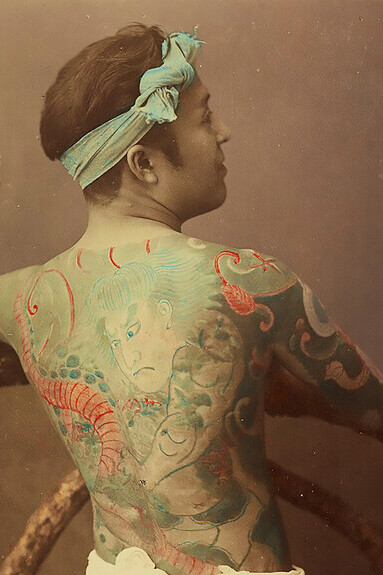 This hand-colored albumen silver print depicts a tattooed Japanese man. The photograph was created in the latter half of the 1800s by either Kusakabe Kimbei (1841 - 1934)