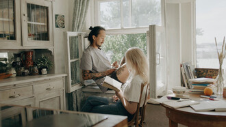 Embracing the simplicity of an unplugged day, the two find solace in shared moments of quietude and literary exploration