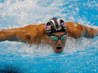 Purple dots of cupping therapy on Michael Phelps 