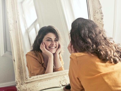 The smiling and loving herself girl