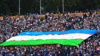 Supporters of the Uzbekistan national football team during a 2010 FIFA World Cup Asian qualification match against Japan at Pakhtakor Stadium in Tashkent