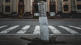 An undetonated missile embbeded into the pavement
