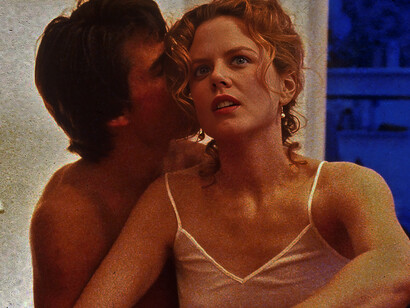 Tom Cruise e Nicole Kidman nel film "Eyes wide shut" di Kubrick (1999), primo piano del top Hanro indossato dall'attrice
